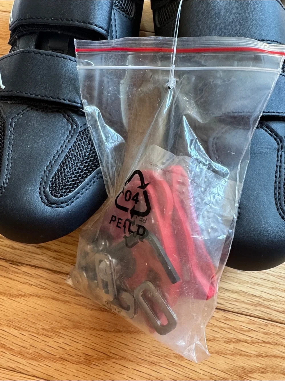 Peloton Black Cycling Shoes with Pink Lining and Light Blue Accents